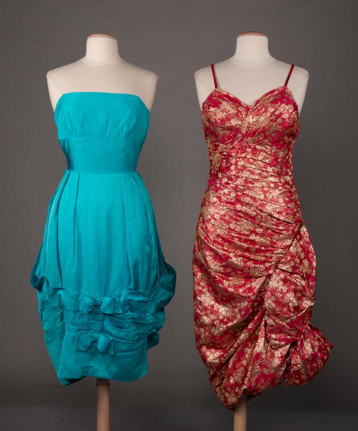 ONE HEIM TURQUOISE & ONE LAME PARTY DRESS, 1950s: 2 1950s party dress: 1 turquoise strapless w/ bubble skirt to waterfall drape from CB, label "Jacque Heim, Jeunes Filles", B 36", W 26", CF L 37", (mending at top of train) & 1 wiggle dress in red & g