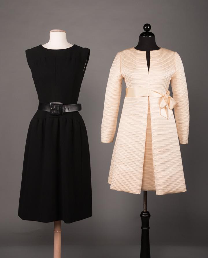 NORELL & TASSEL DRESSES, 1960s: 1 black heavy wool crepe sleeveless day dress w/ hidden slit pockets at H, fitted bodice to gathered low W, unlabeled black leather belt, 1960s, label "Norman Norell", B 34", W 26"-30", L 42", (tear o