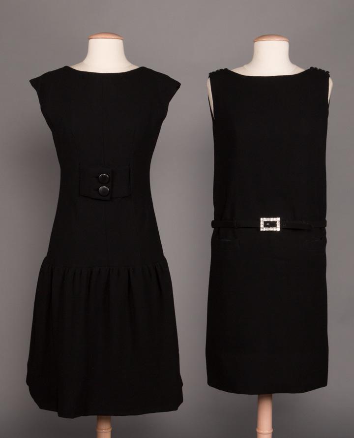 TWO NORMAN NORELL DAY DRESSES, 1960s: 2 black silk crep dresses, both labeled "Norman Norell": 1/ cap sleeve, 2 button W tab sewn to inside to form corset, full drop skirt at H, B 34", W 28", L 40.5", (pulls at left SH, seam separation at