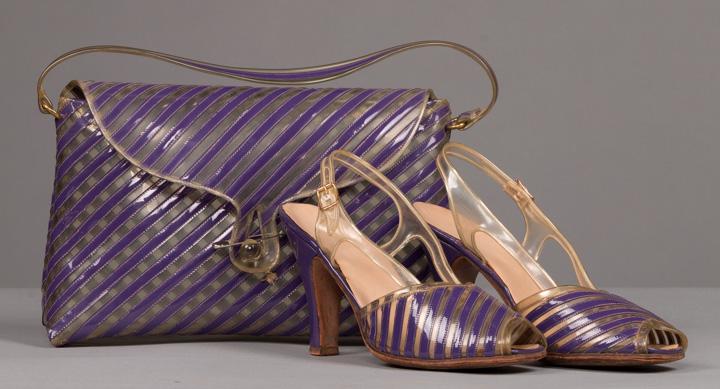 JOAN CRAWFORD PURPLE PLASTIC HANDBAG & SANDAL SET,: 1940s purple & clear plastic sling-back 4" pump w/ open toe & matching handbag w/coin purse, 11" x 2" x 8" (detached Lucite ball closure, corrosion on coin purse closure) shoes & purse excellent, coin