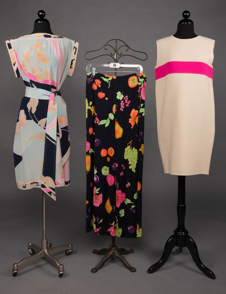 TWO LEONARD & ONE BILL BLASS DAY GARMENTS, AMERICA &: 1 cream & hot pink wool crepe sleeveless dress, CB closure, China silk lining, labeled "Bill Blass", B38", W38", L35"; 1 silk crepe tropical print dress w/ matching belt in shades of blue, pink & yell