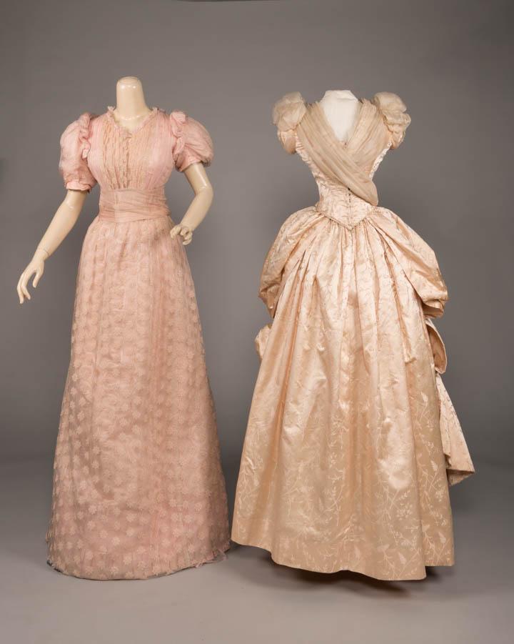 TWO PINK EVENING GOWNS, AMERICA, LATE 1880s: 2-pc silk moire covered w/ embroidered silk chiffon in snowflake motif, puff sleeves w/ standing ruffle a, self-covered CF button closure, couture finishing to feather boned bodice, skirt w/ silk cumm