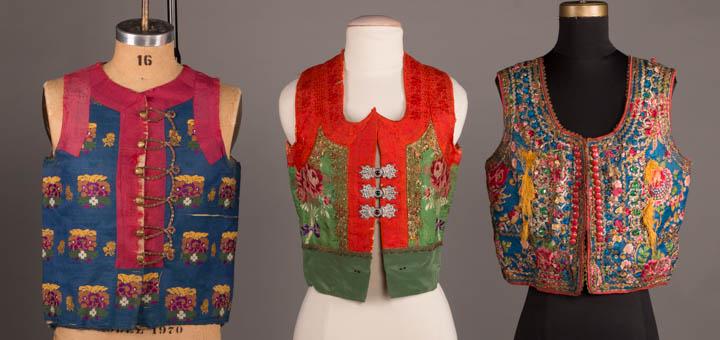 THREE LADIES' FOLK BODICES, CENTRAL EUROPE, 19TH C: 1 blue silk hemp w/ weft brocaded florals & red neck, SH & CF guards, green & orange, brass reticulated button & gold metallic & silk soutache loop appliqued closure, fustian lining, B 36", L 19", (ma