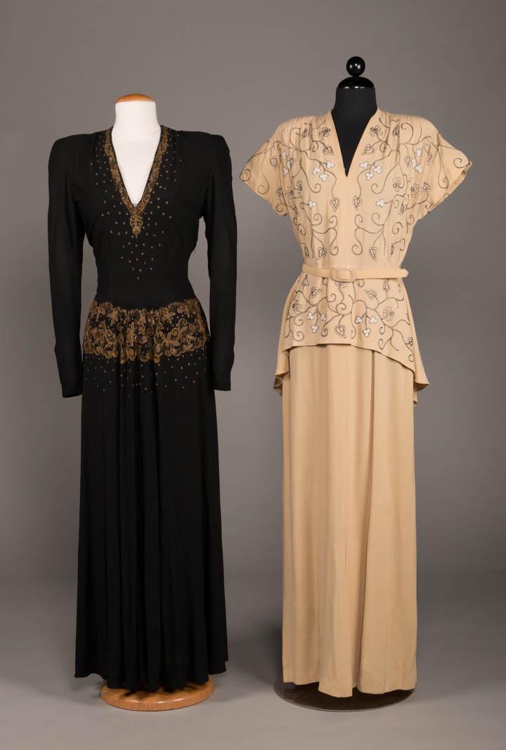 TWO FLOOR LENGTH EVENING DRESSES, AMERICA, 1943 & 1945: Both w/ Cornely embroidery: 1 black w/ sequin, bead & metallic thread embroidery to plunging V-neck & low W, CF W gathers, long sleeves w/ zip cuff, left side zip opening, c. 1943, B 39, W 26", L 57.5