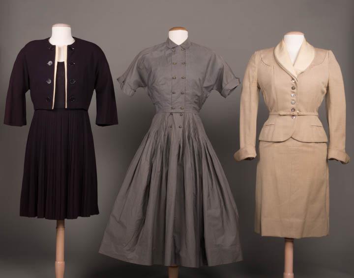 THREE DAY ENSEMBLES, 1946-1948: 1 navy wool crepe suit dress w/ matching jacket w/ cotton pique CF faux facing, c. 1948, B 43.5", W 31.5", L 38" (discoloration on facings, fading on sleeves) good; 1 grey polished cotton sundress, do