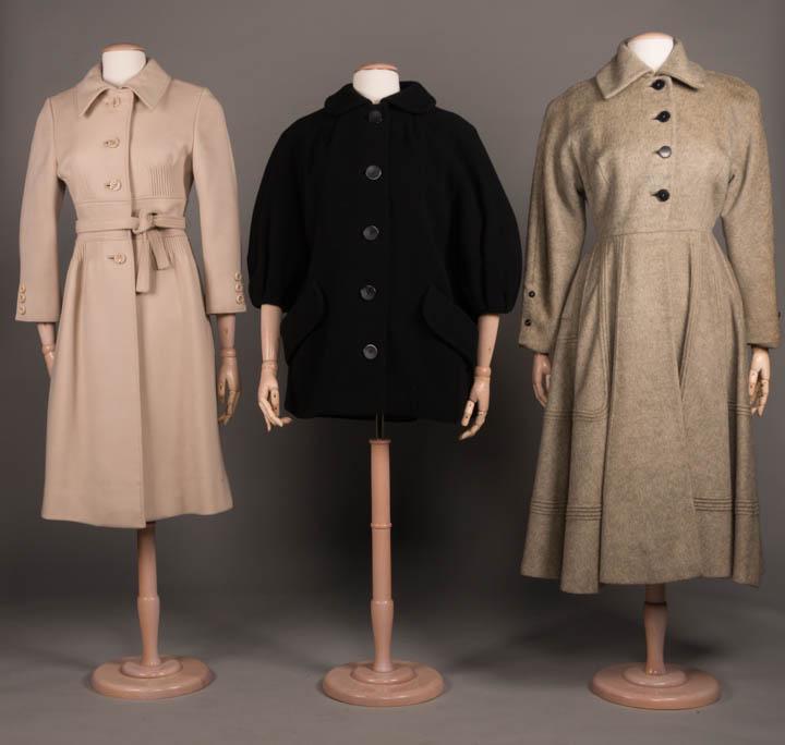 THREE WOOL COATS, ITALY & AMERICA, 1950-1965: 1 brushed double faced cream wool w/ club collar, 4 button & snap closure, wide inset W back w/ welted seams, cartridge pleats under B & below Hs, 3 decorative buttons at cuffs, SS pockets at HS, grei
