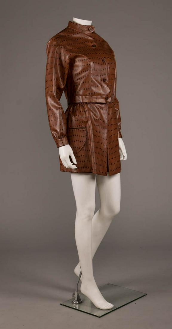 LADIES LEATHER MINI SKIRT SUIT, AMERICA, 1968: Dark brown leather jacket printed w/ diamond & crisscross pattern, band collar w/ CF tab, long sleeve w/ vented button closing band cuff, front w/ princess W dart, light brown sibonne lining, CF woode