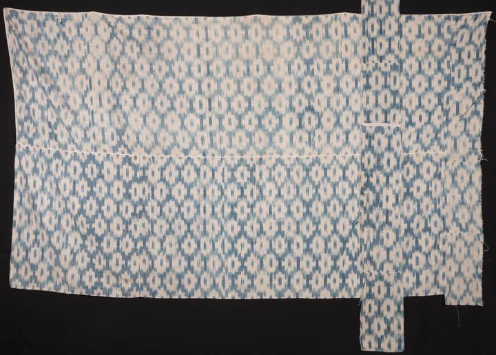 BED HANGINGS, 18th C: Indigo dyed cotton Ikat, Eastern make for Western market, 93" x 55.5", 8" x 107.5" (holes, fraying at edges, fading) fair.