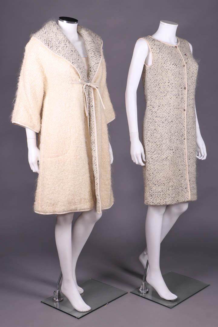 BONNIE CASHIN DRESS & COAT SET, AMERICA, 1955-1960: Wool & mohair boucle & randomized basket weave w/ cream leather bindings at all edges & label "Sills & Co., A Bonnie Cashin Design": coat of cream boucle lined in cream & mottled black boucle w/ shawl