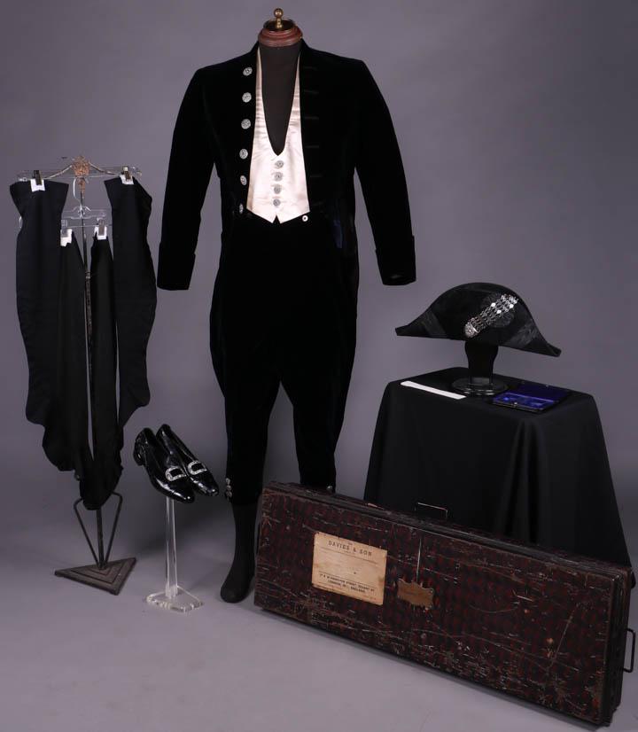 BESPOKE PARLIAMENTARY UNIFORM, ENGLAND, 1934-1936: 1 French black silk velvet tailcoat w/ Marcasite buttons, CH 40", L 19.5"-39", (light crushing to CB) very good; 1 pair trousers, label "Davies & Son (London) Ltd.", W 32", L 35.5", inseam 21.5", (1 "