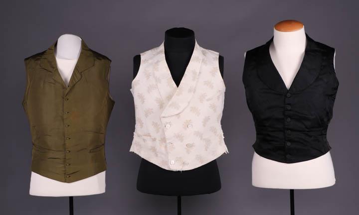 THREE MANS VESTS, 1840-1850s: 1 fine ribbed silk olive green w/ quilted interior, 1840s, CH 41", L 23.5", (1 button missing, 1.5" x 2" fading/stain left of CF, stains to lining) good; 1 cream ribbed cotton pique w/ weft faced flor
