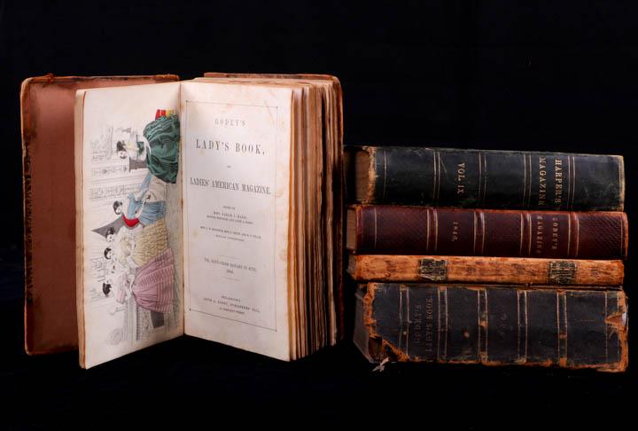 FIVE GODEY'S & HARPERS BOOKS, 1841-1858: 1 "Godey's Lady's Book & Ladies American Magazine, Vol. XXIII - From July-December, 1841", 6.25" x 10" x0.75", (child's handwriting in front cover, foxing to pages, wear to covers, spine cracking); 1 