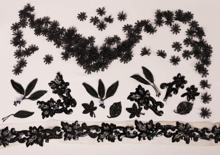 LARGE LOT OF BEADED & SEQUINED TRIMS, ITALY, 1900-1950: Black sequined ribbon, 2.5" x 88"; white ribbon, 1" x 24 yds; Italian leaves, 4" x 1", 2.5" x 1.5", 2.25" x 2"; beaded buttons; beaded & sequined passamenterie Renaisance style dress trims, very good-
