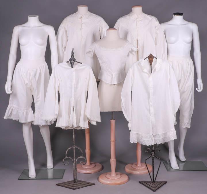 NINE LADIES UNDERGARMENTS, 1850-1870s: 3 ladies open drawers: 1 w/ broderie anglaise & tucks, W 24.5", L 30", 1 w/ tucks & embroidered scalloped lace, W 21.5-33", L 25", 1 ruffled & edged w/ lace, 1860-1870s, W 23.5-33", L 26"; 5 undershir