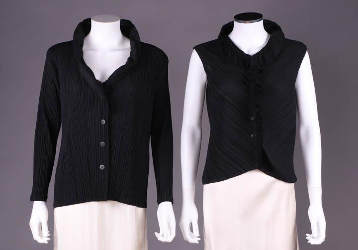 TWO PLEATS PLEASE ISSEY MIYAKE TOPS, JAPAN, MODERN: Both black: 1 jacket w/ double convertible ruffled shawl collar of fine cotton mull continuing to top of CF button closure, label "Issey Miyake", B 48", L 24";1 sleeveless blouse in 2 bias cut panels 