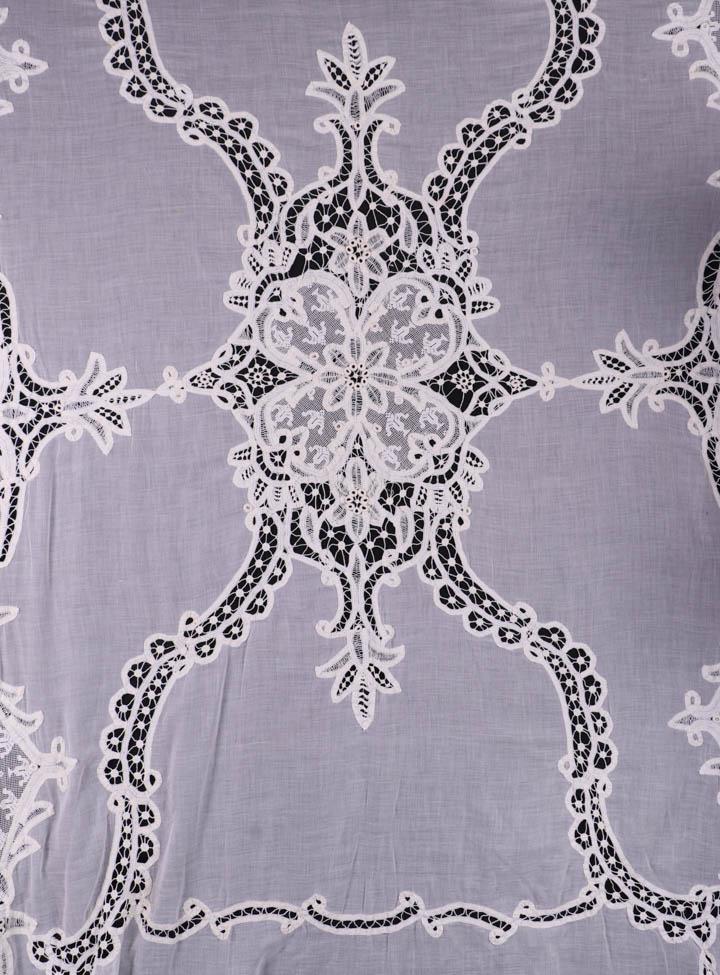 TWO SUMMER BEDSPREADS, EARLY 20TH C: 1 cotton mull w/ faux fillet Shamrock center & surrounding Battenburg tape lace floral scrolls extending to deeply flounced edge, 81" x 119", (0.25" hole on plain edge) very good; 1 net w/ tape edged 