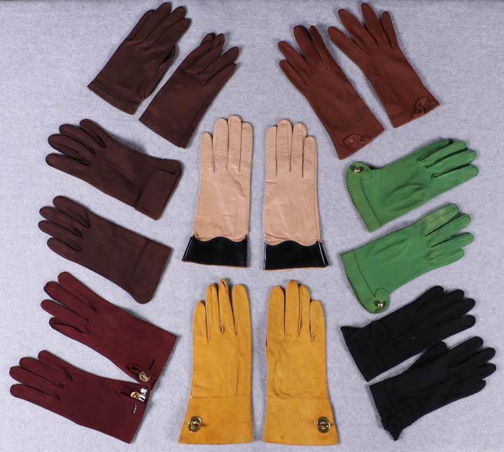 CARDIN & CASHIN GLOVES, FRANCE & AMERICA, 1960s: All w/ palm circumference 6”-6.75": 1 tan leather w/ black patent leather scalloped cuffs, label "CrÃ©ation Pierre, Cardin Paris Made by Aris", L 9.5”, very good; 1 Bonnie Cashin saffron suede w