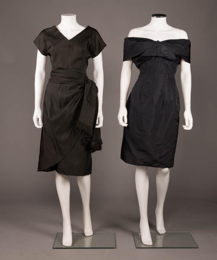 TWO BLACK COCKTAIL DRESSES, 1947-1950s: 1 faille w/ V-neckline front & back, short sleeve, fitted bodice w/ self gathered W wrap continuing into fringed left H drape, knee length straight skirt w/ right side wrapped panel, diagonal self-but