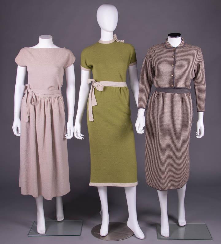 THREE BONNIE CASHIN SWEATER DRESS ENSEMBLES, AMERICA: 1960-1970's: All label "A Bonnie Cashin Design Joseph Guttman & Bros. Inc.": 2-pc dove grey knit w/ gold lame novelty weave SH & W yokes, bateau neckline, faux wrap skirt w/ tie at H, B 35", W 28", L 