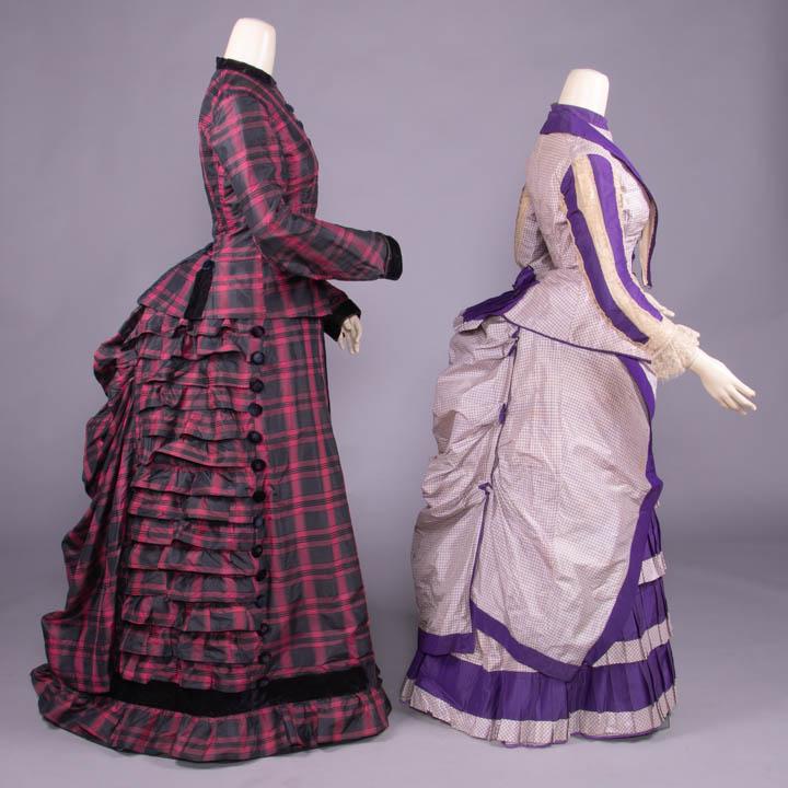 TWO SILK TAFFETA DAY DRESSES, c. 1882: 1 red & black horizontal striped silk taffeta ombre plaid w/ tailored bodice, CF black silk velvet covered button closures, peplum & skirt accents, black velvet collar, cuffs, ruffled & asymmetrically