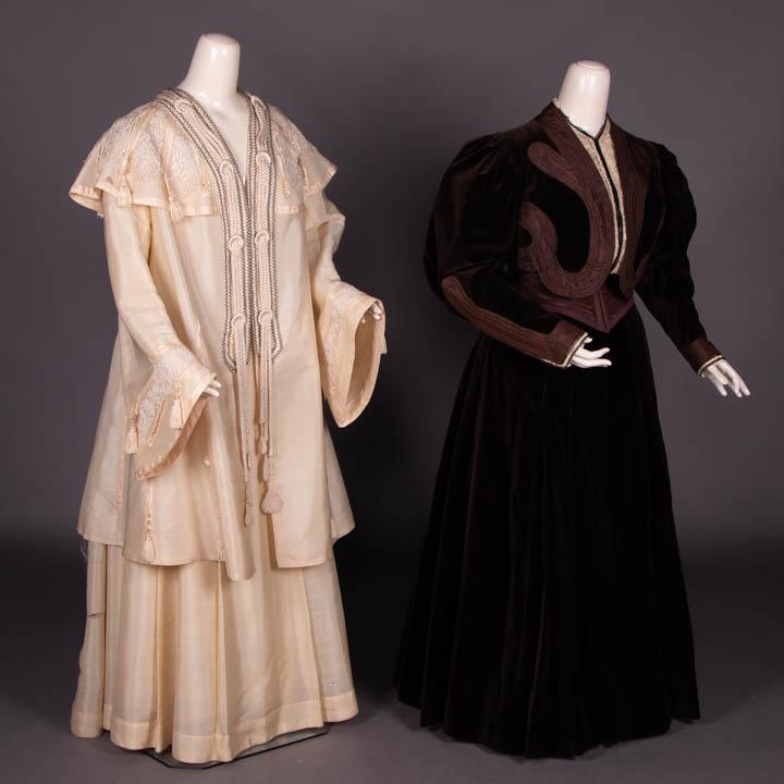 TWO WALKING ENSEMBLES, 1897-1907: 2-pc fine basket weave cream wool jacket & skirt ensemble w/ cape collar of silk taffeta spokes trimmed w/ 3 domed silk buttons & tassels over chemical lace, triple cord drops over SHs & at CF, B 46.5