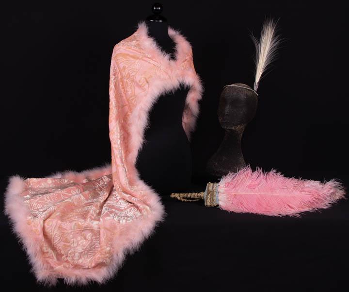 THREE FEATHERED ACCESSORIES, 1920-1930s: 1 feather trimmed voided pannÃ© velvet throw trimmed w/ fine dyed marabou feather edging, backed w/ printed moirÃ© cape, 36" x 60", (feathers shedding, light discoloration/stains, tiny-0.75" spot 