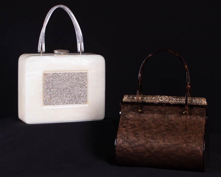 TWO WILARDY BOX BAGS, NEW YORK, 1955-1959: 1 opalescent white w/ rhinestone rectangle at front, single handle split, twisted & riveted, self-covered closure w/ silver tone setting, black moirÃ© lining, label "Original Wilardy New York", c. 1