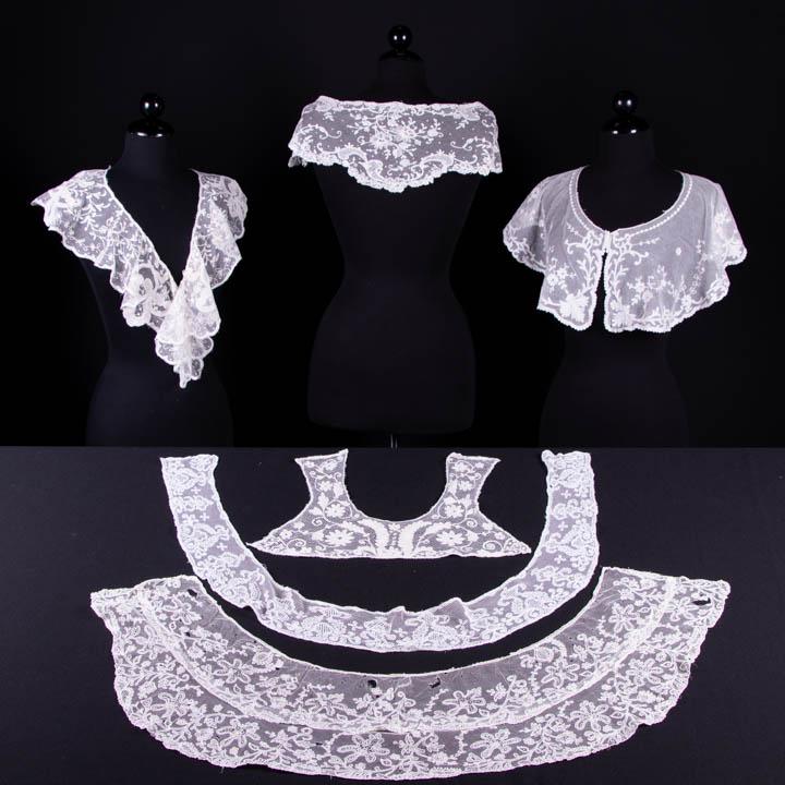 COLLECTION OF WHITEWORK EMBROIDERED COLLARS, 1830-1910: Six chainstitch or Tambour embroidered natural or stylized florals & Baroque inspired motifs on net grounds Wd range 1"-8", circumference range 26.5"-106": 1 shaped bertha, (ends & edges cut); ); 1 ir
