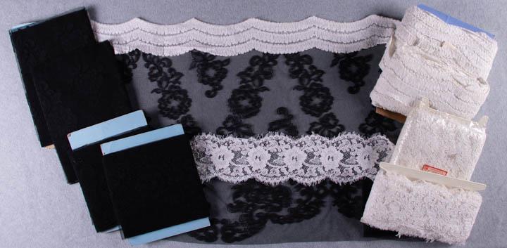 BLACK & WHITE LACE YARDAGE, FRANCE & AMERICA, MID 20TH: 2 lengths of 3-tiered white lace, label "Made in France", Wd 4.5", total L 45+ yds, (4 lengths, each 401"-413", patches of staining & fraying); 1 cellophane wrapped lace, label "Roth Import Co. Inc.",