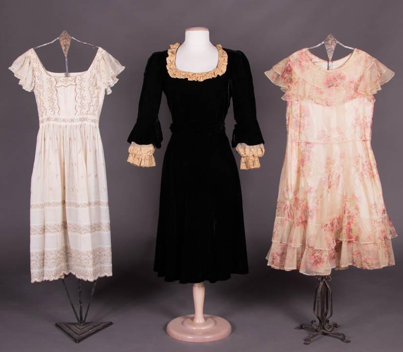 THREE GIRLS DRESSES, 1850s & 1920-1930s: 1 cream cotton mull w/ brown, blue & white Heilmann cotton embroidery, 1850s, CH 28", W 22", L 39", (tiny-0.5" holes around skirt, tiny-0.75" spot stains, repair CB skirt panel & left SH, CB W closure