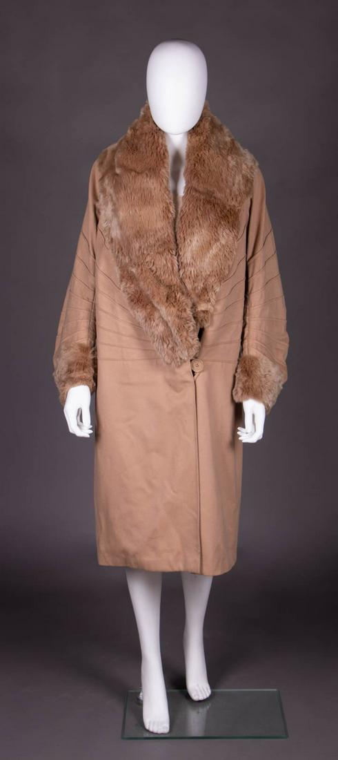FUR TRIMMED CAMEL COAT, LONDON, MID 1920s: Camel coat w/ broad dyed rabbit fur collar & cuffs, single button closure at left front W, radial piecing from closure to SSs & over sleeves, label "Margaret Marks Knights Bridge", B 43", W 45", L 40.