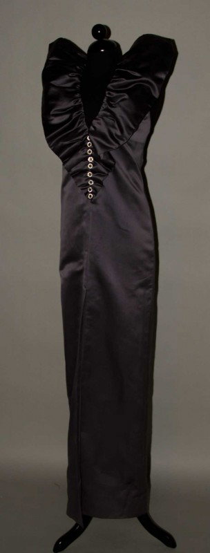 GALANOS EVENING GOWN, 1970s: Pewter satin sheath, halter w/ flounced collar & CF rhinestone buttons, low back, very deep front skirt slit, pewter China silk lining, labeled "GALANOS", couture quality, B 32", H 35", L 59.5", (1 sm