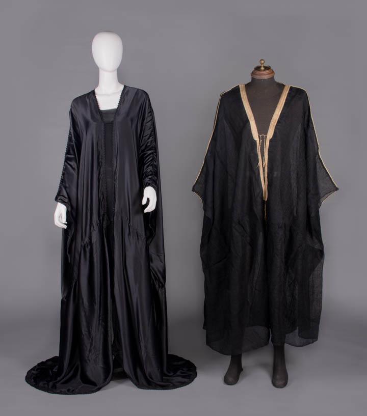 WOMAN'S SILK ABAYA & MAN'S WOOL BISHT, MID 20TH C: 1 black silk satin woman abaya w/ crochet edge, label in Arabic, flat Wd 63", L 61", (scattered tiny pulls, 2" faded stamped label CF opening) excellent; 1 hand loomed black fine wool gauze manâ€��