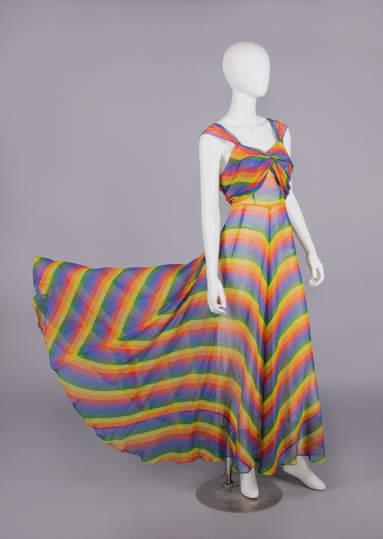 RAINBOW CREPE CHIFFON PARTY DRESS, LATE 1930s: Rainbow printed silk crepe chiffon w/ broad SH straps pleated into bodice & draping over SH into crossover back panels, draped bodice front from twisted center into ties at CB, full skirt of manipulat
