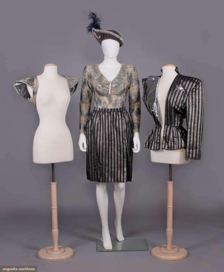 BARBARA MATERA FIVE PIECE COSTUME, NEW YORK, 1990s: 5-pc c/o black, silver & grey metallic ribbon stripe 1 arm blazer w/ 1 oversized silver lapel & matching pencil skirt w/ thigh slit, fitted bolero w/ stiffened SH extensions & leotard of silver metall