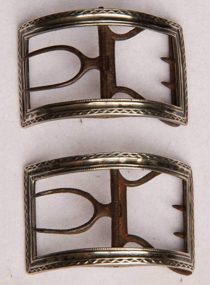 PAIR SILVER SHOE BUCKLES, IRELAND, c. 1750: Sterling w/ touch marks, zig-zag pattern around outer edge, 1.5" x 2", excellent. MCNY