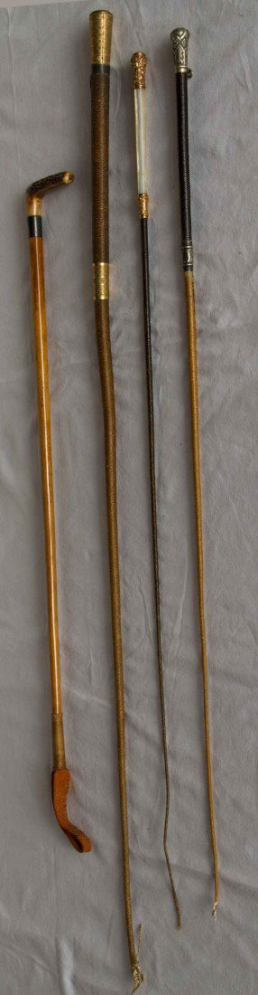 FOUR RIDING CROPS, 1850-1920: 3 long thin crops w/ shafts of woven waxed plant fibre, (leather end tips missing): 1 1850-1875 etched gold grip inscribed, "F.N. Bangs", w/ 1 silver faux belt & buckle cuff & 1 etched gold cuff, L 37