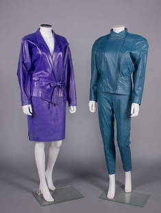 JEAN CLAUDE JITROIS & MICHAEL HOBAN LEATHER ENSEMBLES, USA & FRANCE, 1980s: 2-pc ensemble c/o purple long dolman sleeve jckt w/ traditional notched suit collar, asymmetrical crossover front & tied W closure, matching skirt w/ CB zip closure, lined in rayon, label “Jean