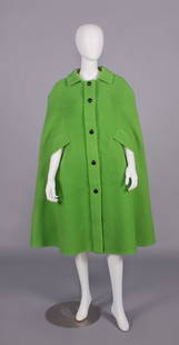 COUTURE DIOR KELLY GREEN WOOL CAPE, PARIS, A/W 1966: Kelly green doubled faced textured wool shag w/ top stitched shirt collar, arm slashes & CF band, CF black domed button closures & tabbed arm slits, label “Christian Dior Paris Automne-Hiver