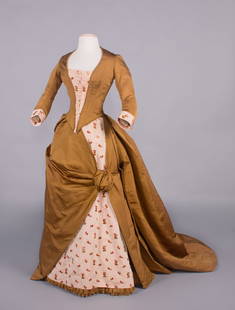 DIRECTOIRE REVIVAL DINNER DRESS, PARIS, c. 1888: 2-pc in bronze silk ottoman c/o fitted bodice w/ built in buttoned stomacher, fitted sleeves cuffs & petticoat trimmed in gregoire velvet sprigs on pink ribbed silk ground, double piping at neck, CF