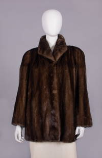 DIOR MINK COAT, LATE 1980s: Mink coat w/ convertible collar, covered hook & loop closures, label “CD de Christian Dior Fourrures&rdquo;, B 44&rdquo;, L 31&rdquo;, (light wear) excellent.