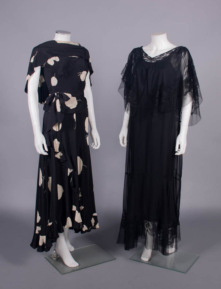TWO SILK CHIFFON OR CREPE DINNER DRESSES, 1932-1935: 1 black & white printed fine silk crepe evening dress w/ high front cowl neck into CB caped collar, bias cut flared skirt trimmed w/ self-ruffles, original sash belt, c. 1935, B 34”, W 30”