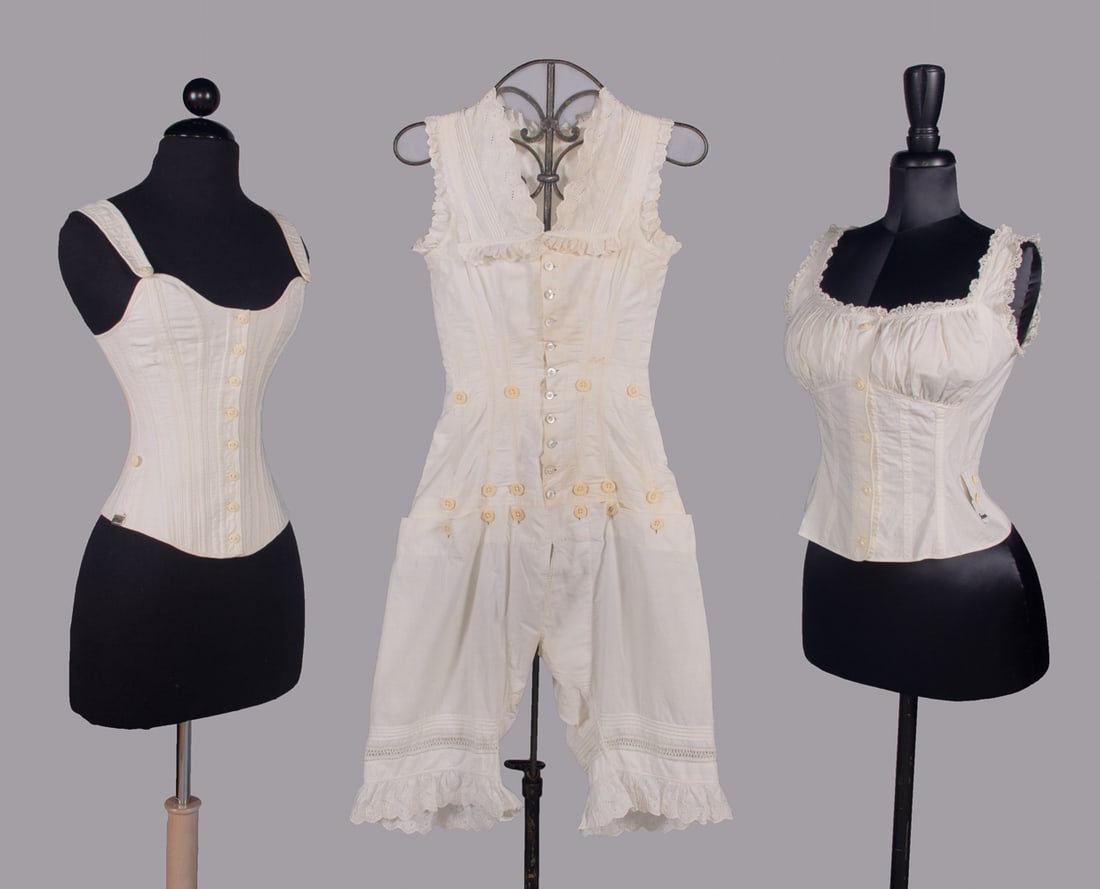 CORSET, CAMIKNICKERS & CAMISOLE, 1880s: 1 cotton twill button-front corset, stamped “Ferris, August 27 89”, B 26”, W 19”, H 22”, L 18”, (laces N/I, discoloration along boning, few stains up to 1”, tarni