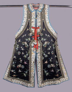 LADIES EMBROIDERED VEST, CHINA, c. 1900: Sleeveless black silk coat heavily embroidered w/ floral, bat, butterfly & bird motifs, cream embroidered bands to neckline, armscye, CF, SS slits & hem, patterned silk & button closures at CF, CH 58&