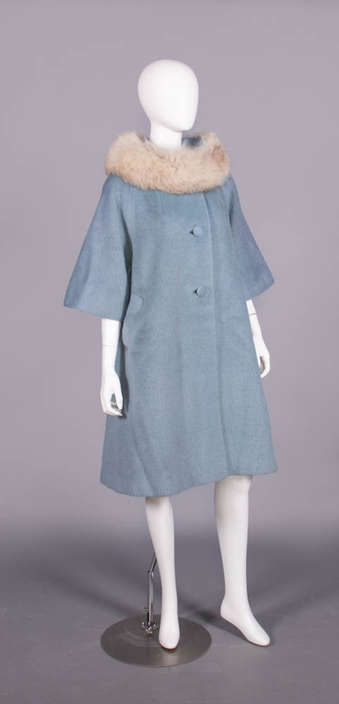 LILLI ANN WOOL BLEND SWING COAT, SAN FRANCISCO, 1950s: Baby blue wool & mohair shag w/ rose satin lining, fox fur collar, glove length raglan sleeve, label “Lilli Ann, Paris, San Francisco”, “Tisse’ a Paris por la Lune de miel”, SH-SH 18