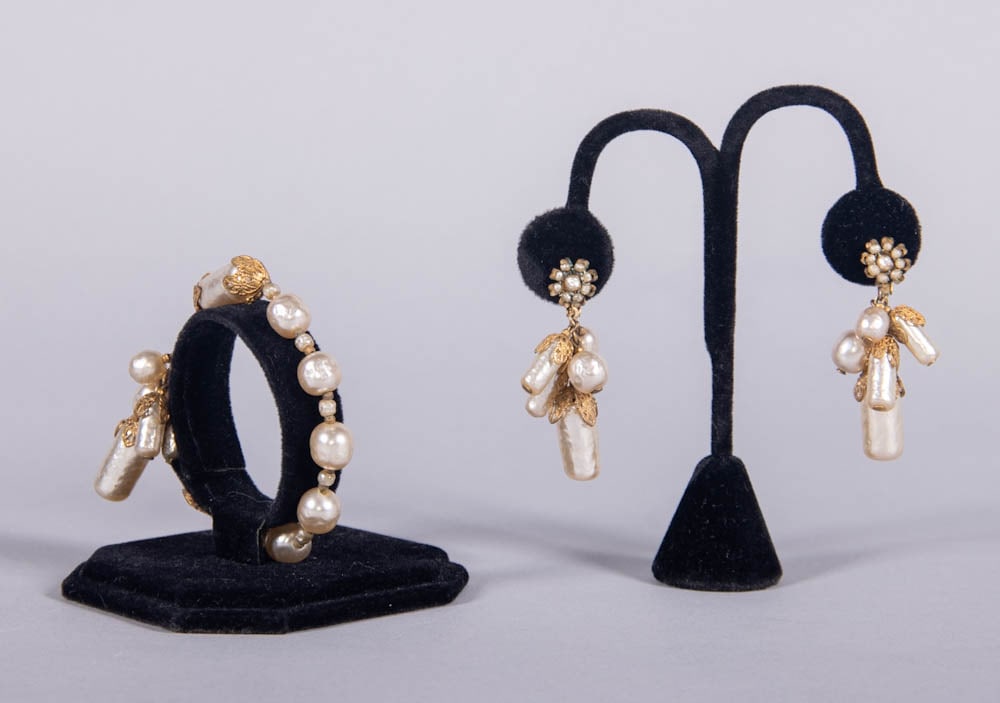 MIRIAM HASKELL PEARL EARRINGS & MATCHING BRACELET, USA, MID 20TH C: 1 pair of pearl & gold filigree drop earrings, stamped “Miriam Haskell”, 0.75” x 2.125”, (metal oxidizing, minor scratches to faux pearls, top metal flowers dirty & heavily oxidizi