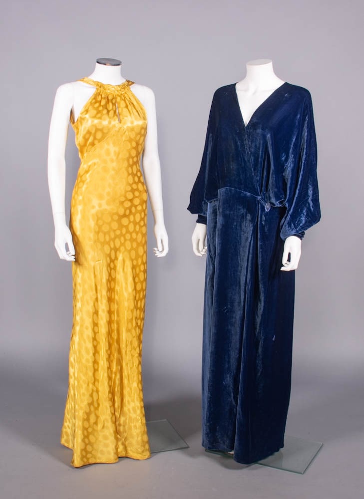 ONE SILK EVENING GOWN & ONE VELVET ROBE, 1930s: 1 gold silk patterned silk sleeveless evening gown w/ gathered front halter neck over deep keyhole & into plunging square back, half back belt & bias cut floor length skirt, 1930s, B 36”, W 28&r