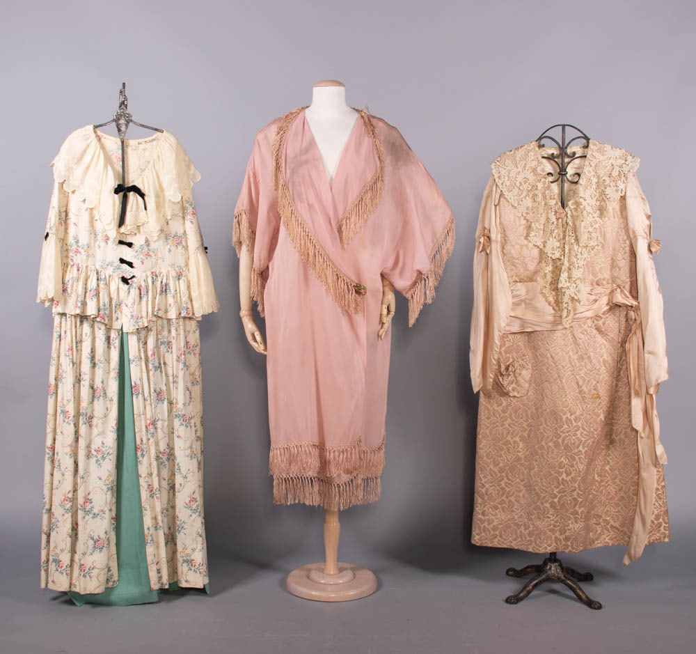 SILK DRESSING ROBE, TEA DRESS & COLONIAL FANCY DRESS COSTUME, 1925-1935: 1 Colonial fancy dress ensemble c/o dress & petticoat of white cotton printed w/ blue, pink & yellow floral motif & light-blue cotton trimmed w/ white embroidery & black velvet ribbon, 1935, good; 1 d