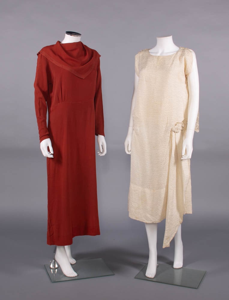 TWO SILK CREPE DAY OR WEDDING DRESSES, 1920-1930: 1 rust colored silk crepe day dress w/ draped front collar, self-covered buttons at CB neck & to wrists of long sleeves, c. 1930; 1 novelty puckered silk crepe country wedding dress w/ attached calais