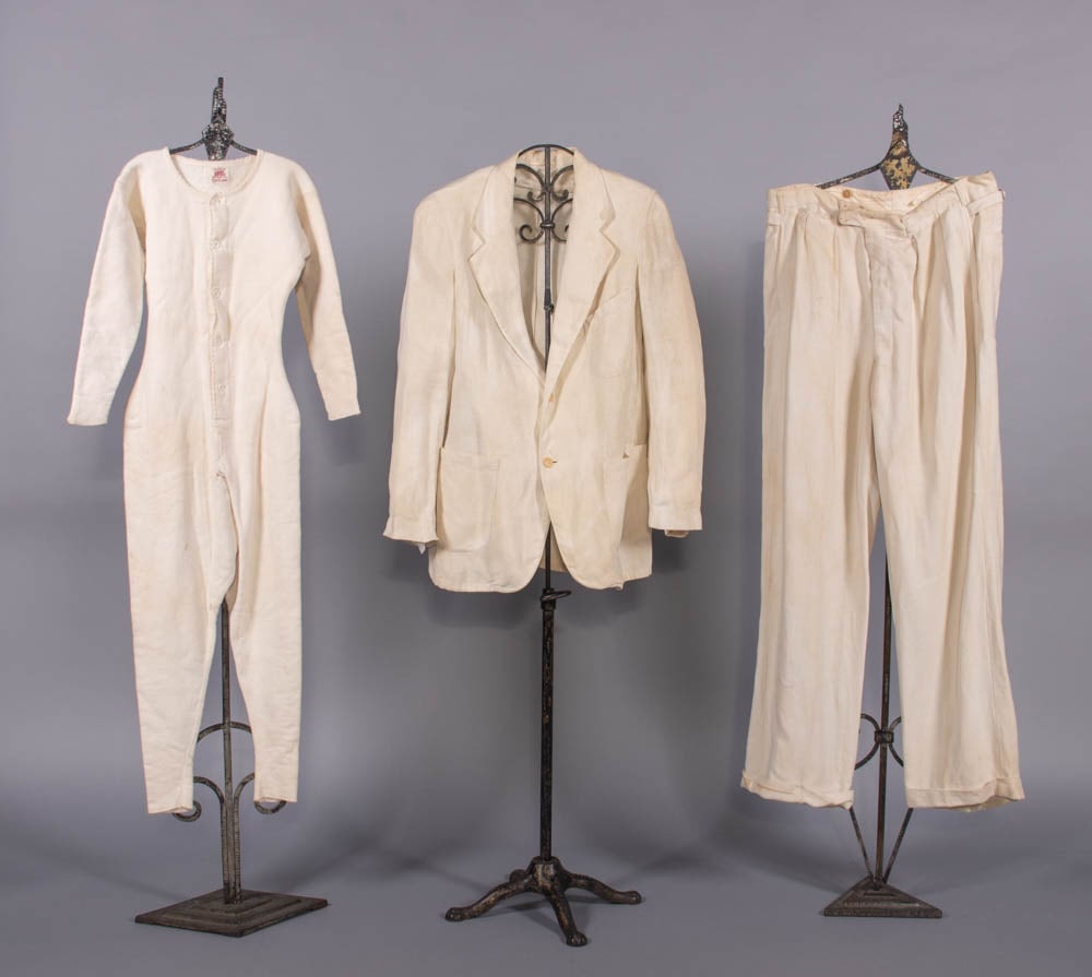 GENTS LINEN SUIT & UNION SUIT, 1930s & c. 1898: 1 white knitted cotton fleece union suit w/ crochet, MOP buttons, 1898, label “Vellastic”, excellent; 2-pc cream linen suit w/ composition buttons, c. 1930s, very good. Measurements & conditio